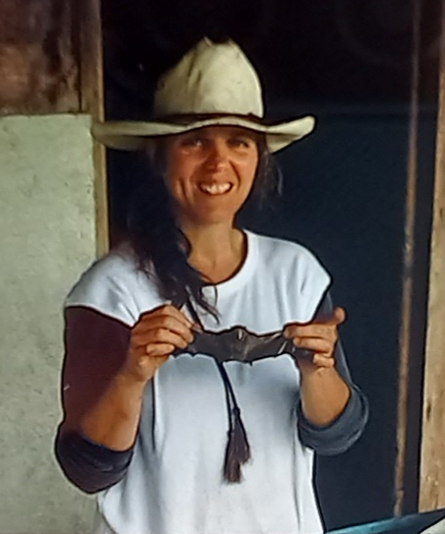Ms. Chupasko holding a tropical bat in Costa Rica, 2002